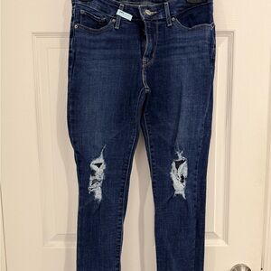 711 Levi's Dark Blue Distressed Skinny Jeans